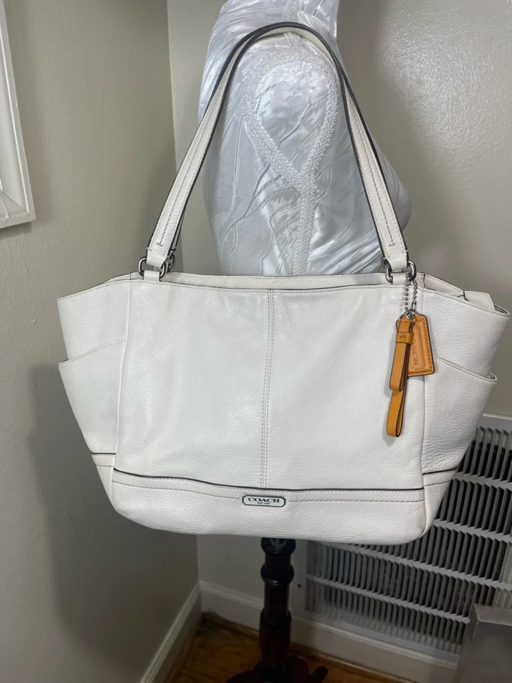 Coach White pebbled shoulder Leather Tote with Tan Accent Charm